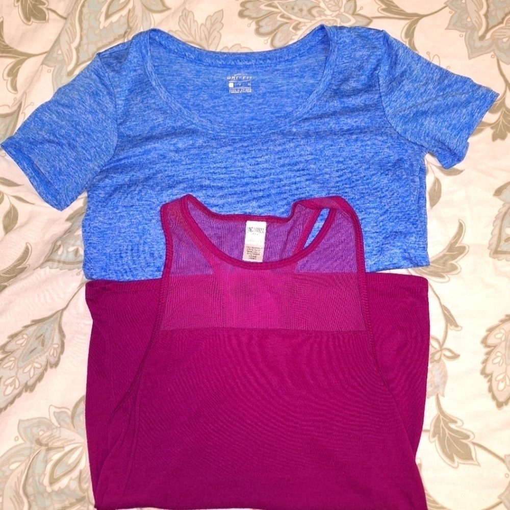 A bundle of 2 small ladies shirts. A Victoria Sport and a Nike dri-fit size smal